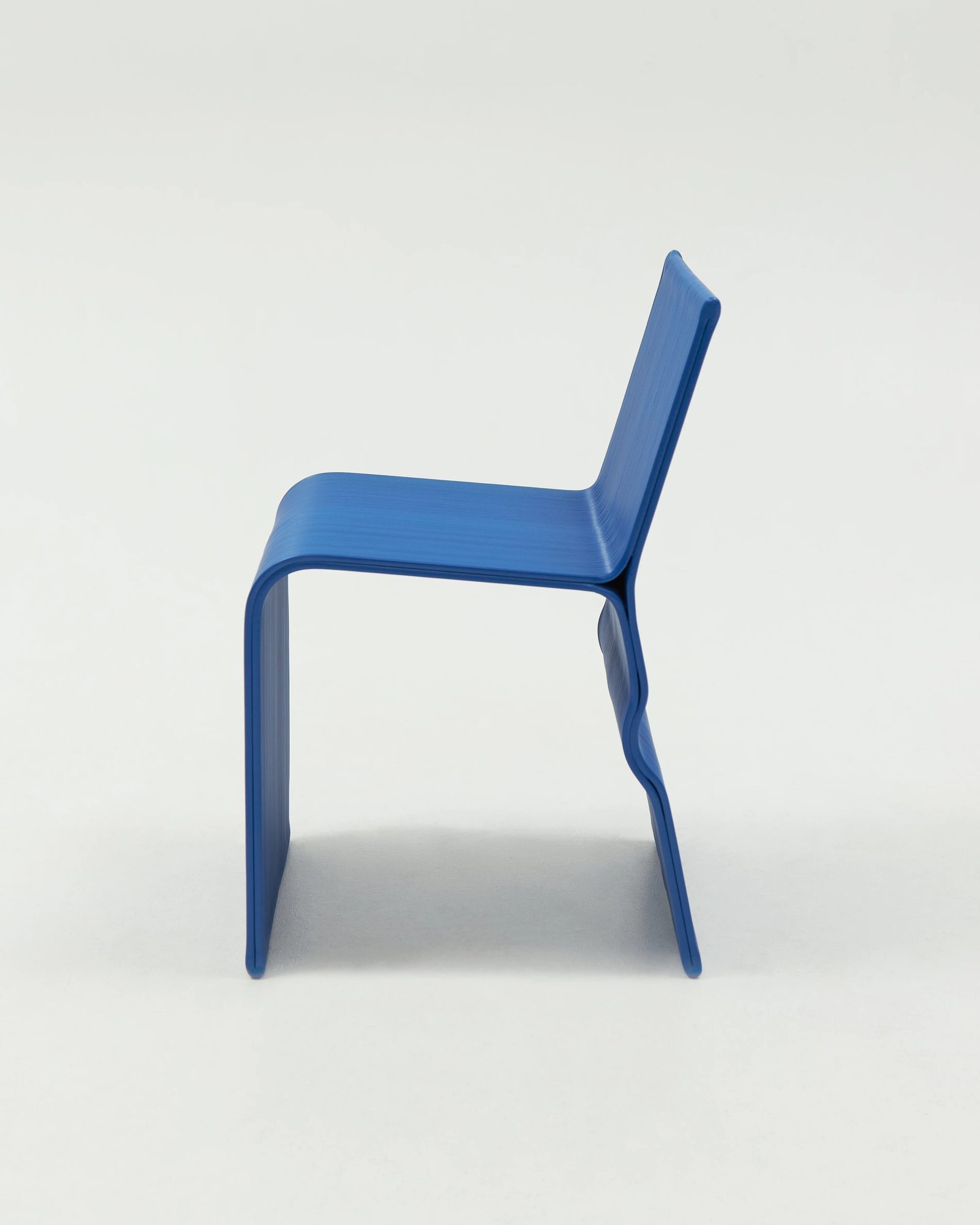 EBKO chair in blue, side profile, printed from recycled plastic